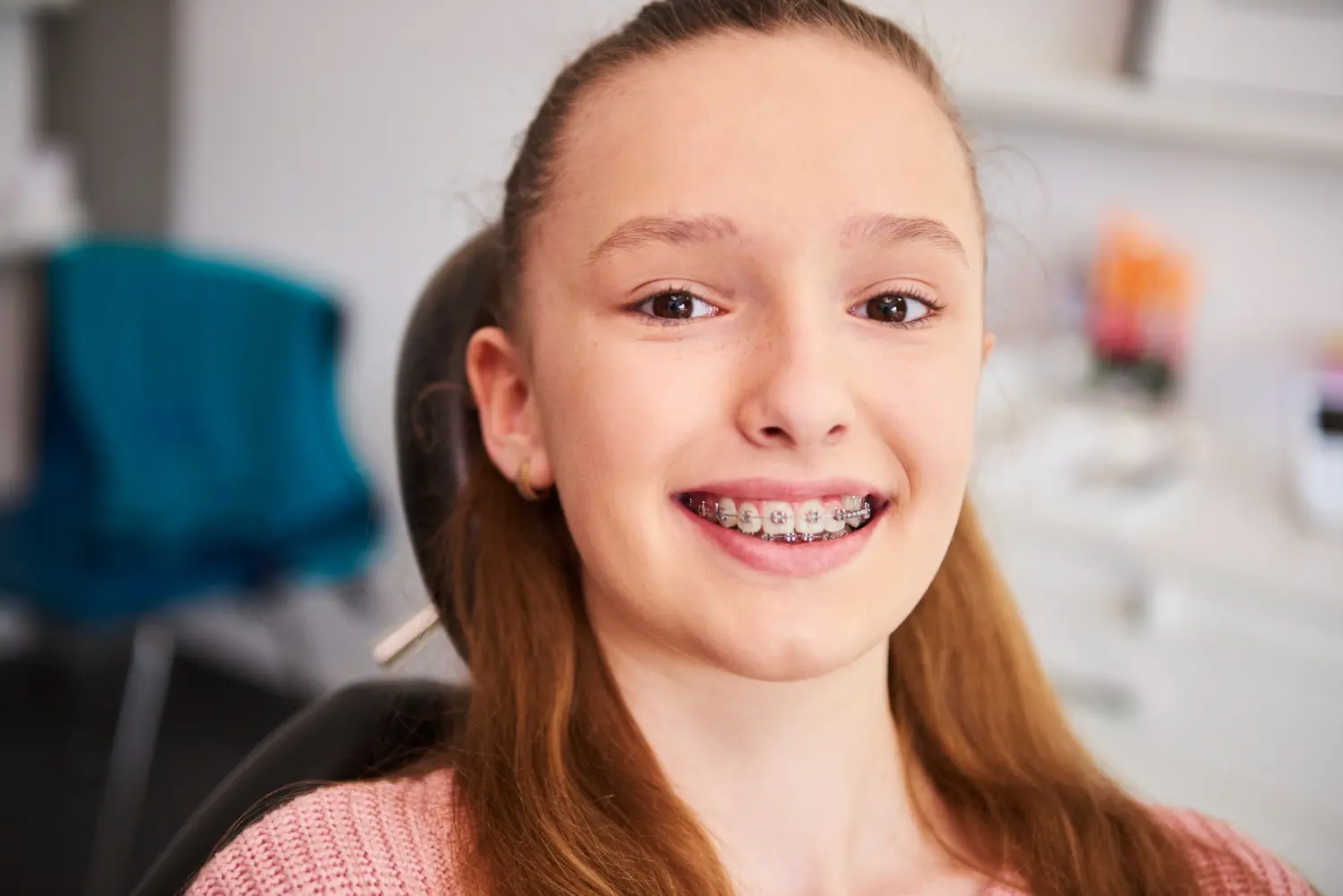 Women Smiling with dental braces